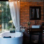 Which Benefits Make Solid Surface Bathtub Wall Panels Popular For Modern Bathroom Designs